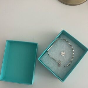 Authentic Tiffany and co pink heart tag beaded bracelet